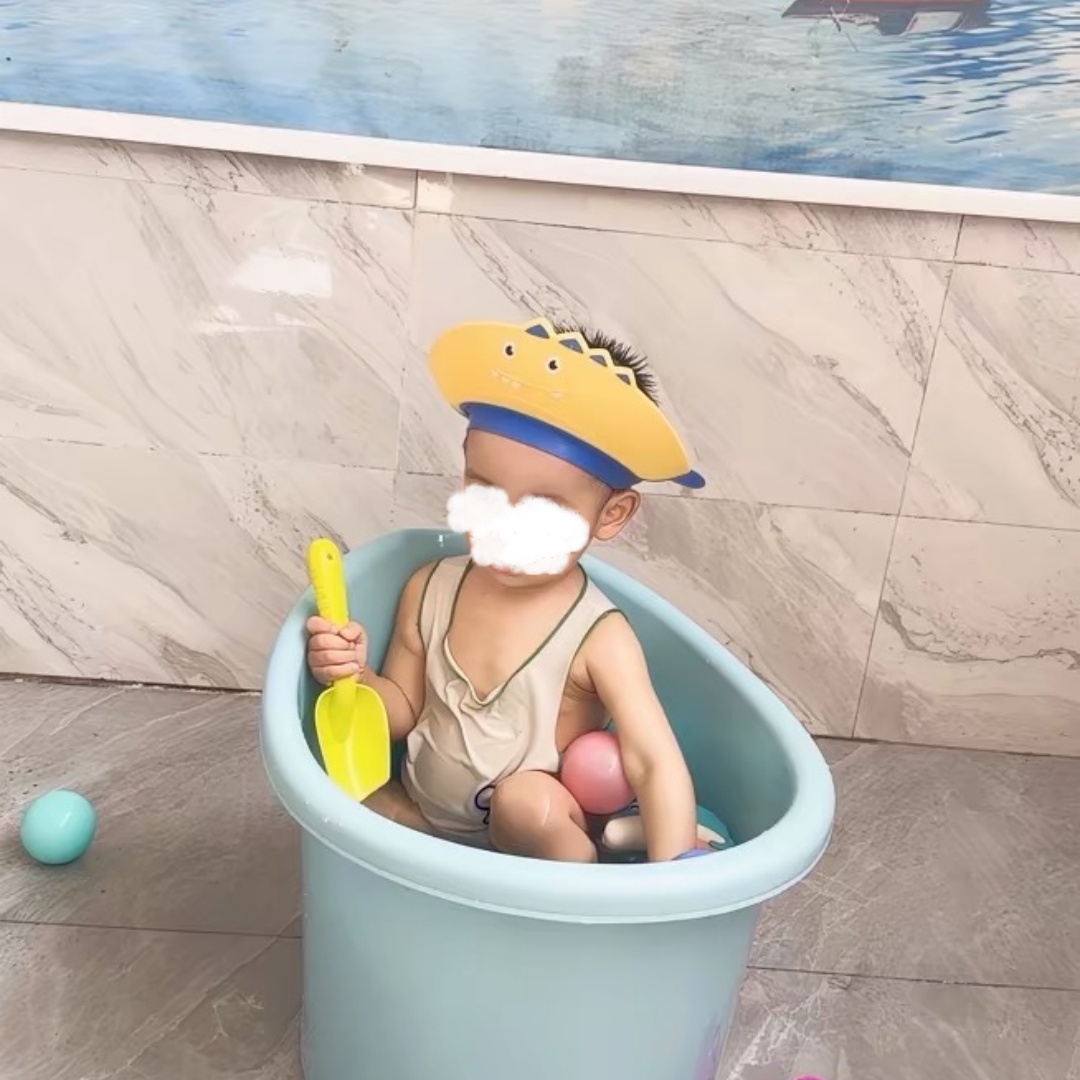 Bonnet de douche en silicone p - Hair Care Baby avis et prix